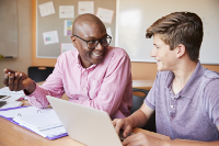 You can be a tutor (or hire a tutor) at Dash Class. A tutor helping a student.